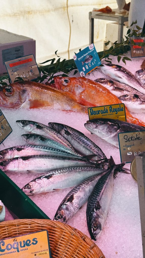 Fresh fish arranged on ice at a market stall in Maisons-Laffitte, France.