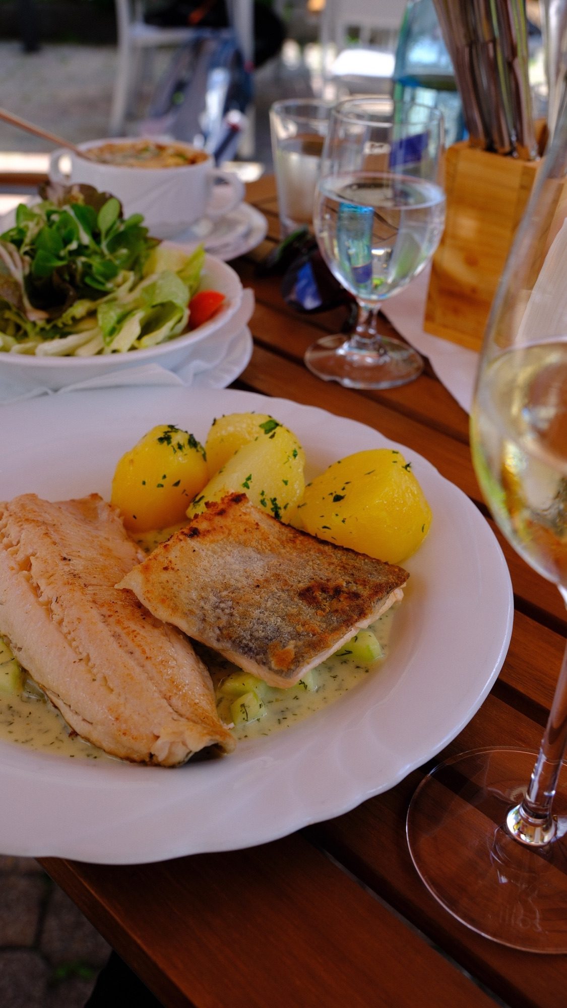 Gebratene Forelle with parsley potatoes served at Gasthof Seehaus beside Almsee.