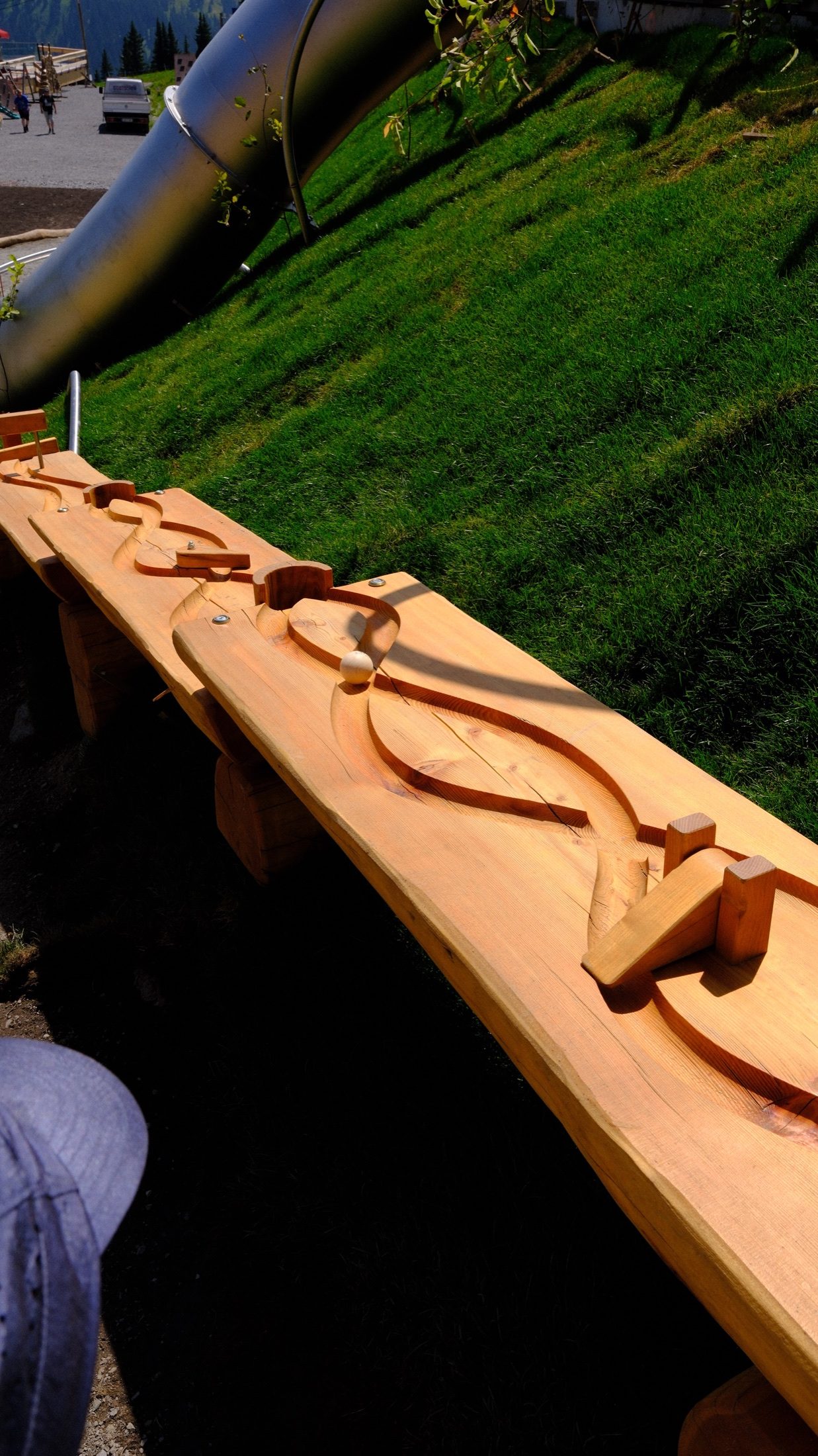Close view of a wooden interactive play element on Golm mountain