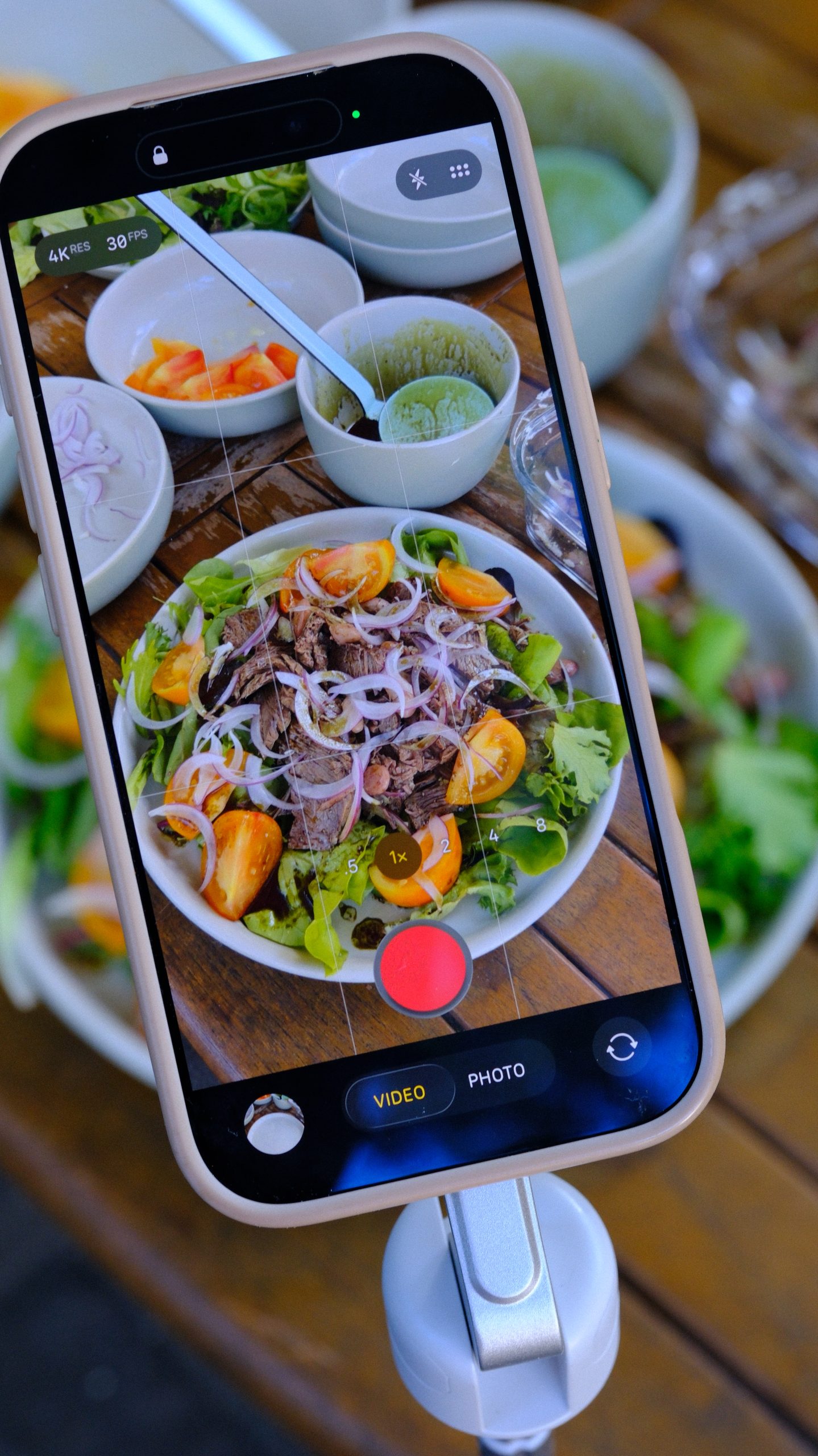A phone recording the finished Styrian boiled beef salad during the Cadre Nomade recipe shoot