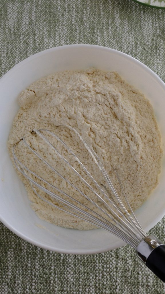 Bread flour, whole-wheat flour, and oat bran combined with a whisk