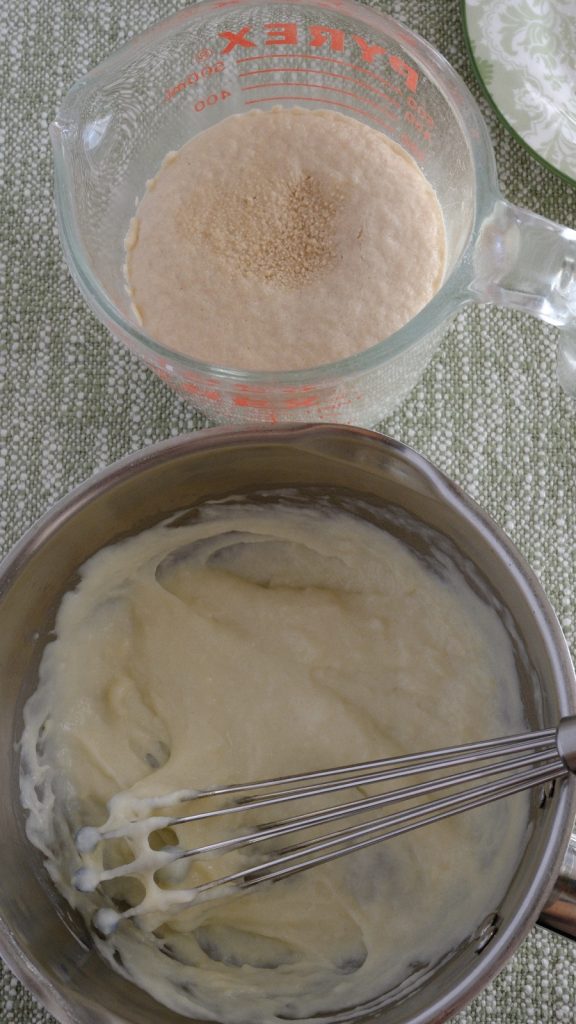 Foamy activated yeast mixture beside the cooled tangzhong